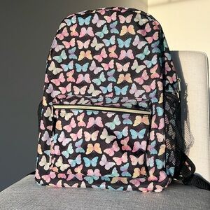 Adjustable backpack with multi colored butterflies
